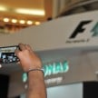 Jazeman Jaafar drives the Mercedes AMG Petronas W03 Formula 1 car around the streets of Kuala Lumpur