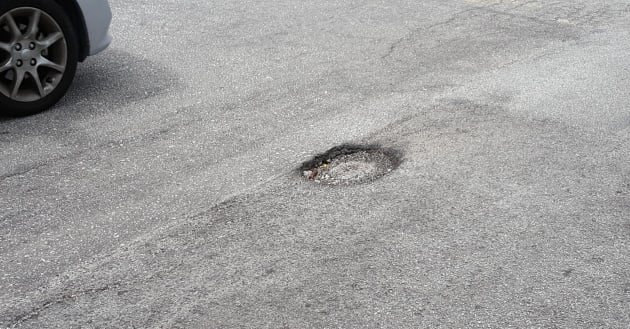 Reporting potholes in Selangor with the Waze app