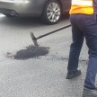 Reporting potholes in Selangor with the Waze app
