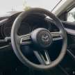 2022 Mazda 3 with Mazdasports body kit, dark grille surround, leather/suede interior on display in Malaysia