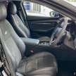 2022 Mazda 3 with Mazdasports body kit, dark grille surround, leather/suede interior on display in Malaysia