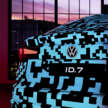 Volkswagen ID.7 debuts with trippy camo at CES – EV sedan with 700 km of range; launch in Q2 this year
