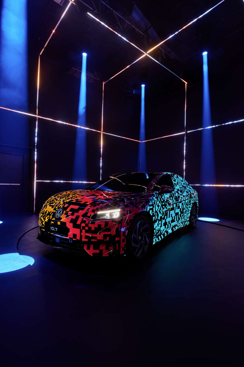 Volkswagen ID.7 debuts with trippy camo at CES – EV sedan with 700 km of range; launch in Q2 this year 1599689