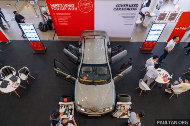 EVx 2023: myTukar display of half-and-half refurbished car, plus 35% off respray packages today at SCCC