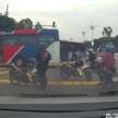 Johor Bahru police uses buses to block <em>mat rempit</em>; 115 bikes seized in joint operation with JPJ, JAS